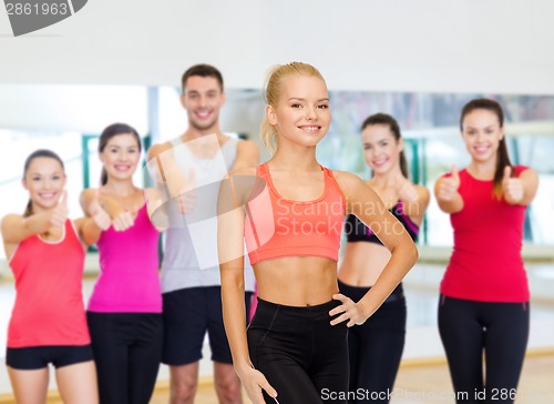 Image of beautiful athletic woman in sportswear