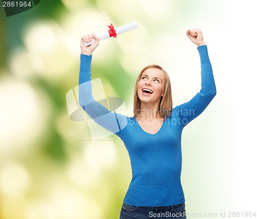 Image of smiling woman with diploma