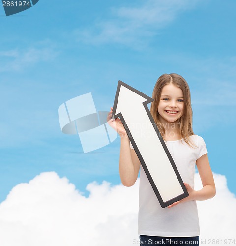 Image of smiling little girl with blank arrow pointing up