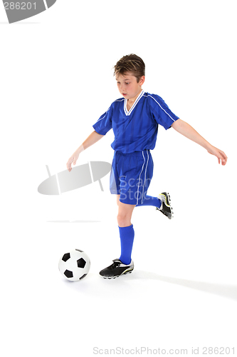 Image of Kicking soccer ball