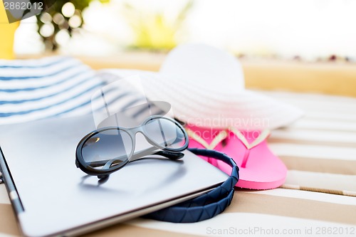 Image of close up of laptop on beach