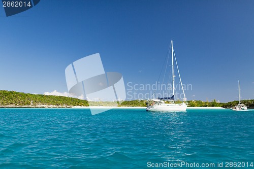 Image of white boat at blue sea