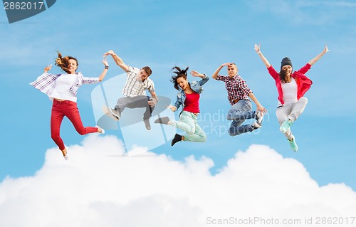 Image of group of teenagers jumping