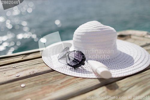 Image of close up of beach accessories at seaside