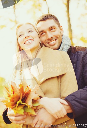 Image of romantic couple in the autumn park