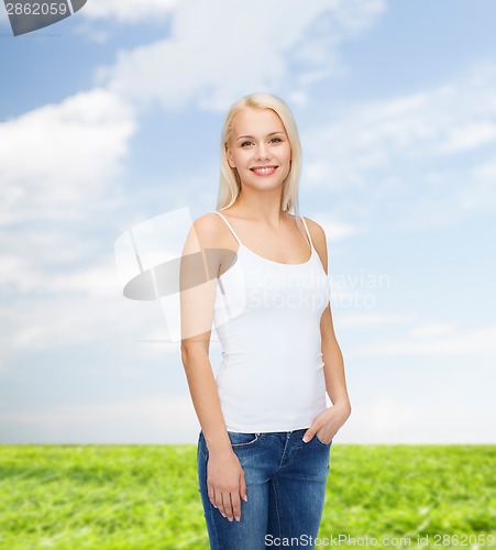 Image of smiling woman in blank white t-shirt