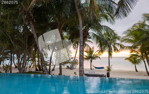 Image of swimming pool on tropical beach