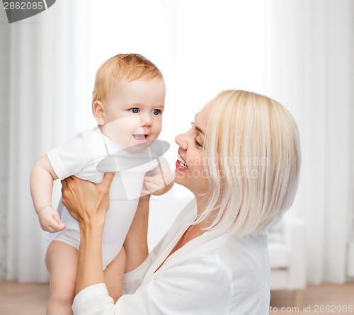 Image of happy mother with smiling baby