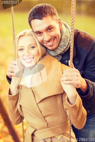 Image of romantic couple in the autumn park