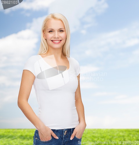 Image of smiling woman in blank white t-shirt