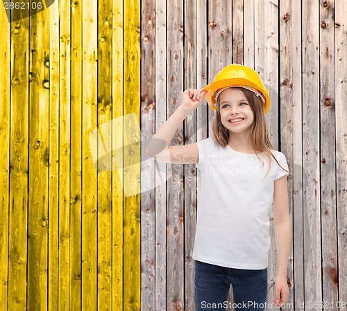 Image of smiling little girl in protective helmet