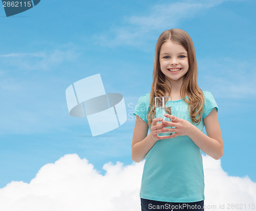 Image of smiling little girl with glass of water