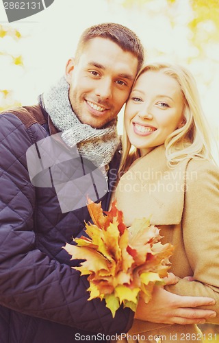 Image of romantic couple in the autumn park