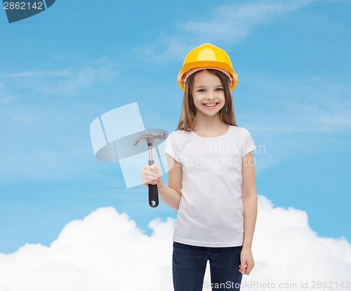 Image of smiling little girl in protective helmet