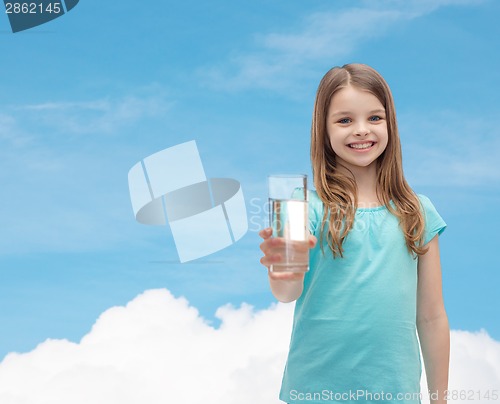 Image of smiling little girl giving glass of water