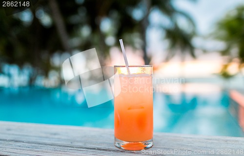 Image of cocktail drink on tropical beach