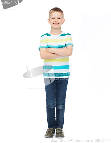 Image of little boy in casual clothes with arms crossed