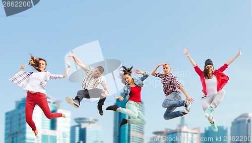 Image of group of teenagers jumping