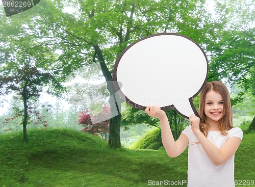 Image of smiling little girl with blank text bubble
