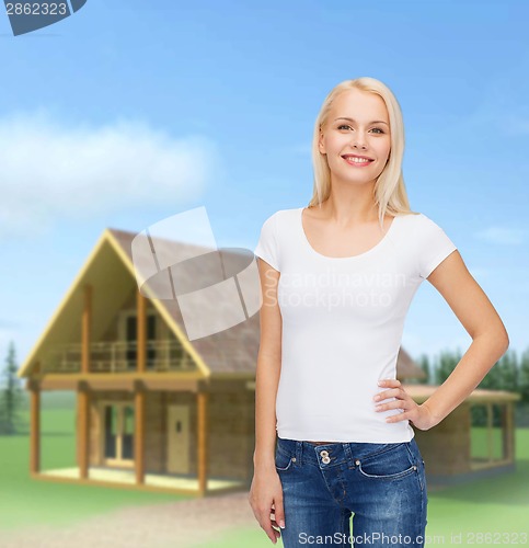 Image of smiling woman in blank white t-shirt
