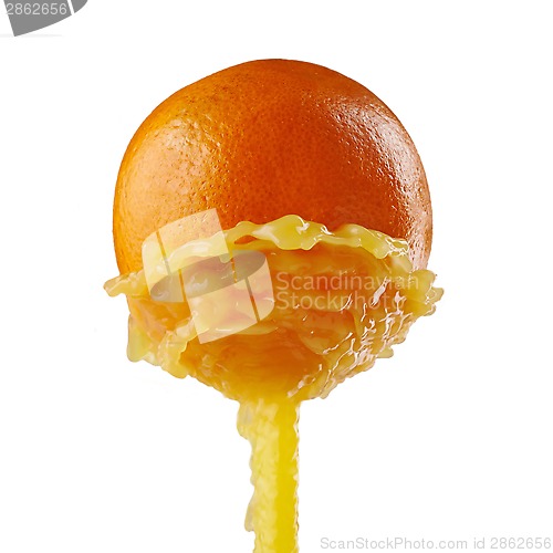 Image of orange juice splashing on a white background