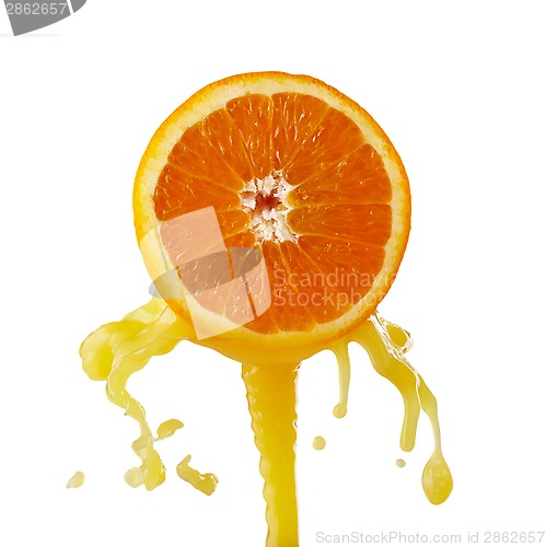 Image of orange juice splashing on a white background