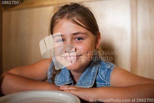 Image of Little girl in cafe