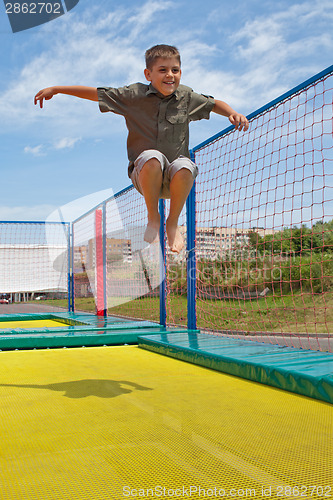 Image of Child on a trampoline