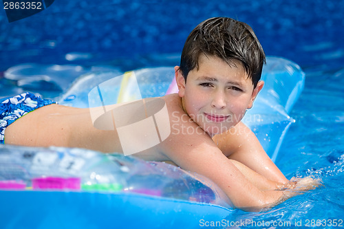 Image of Boy in swimming pool 