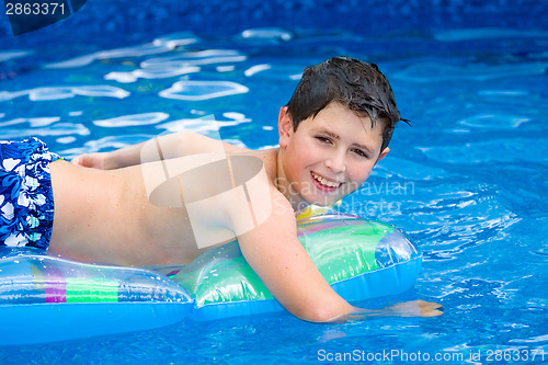 Image of Boy in swimming pool