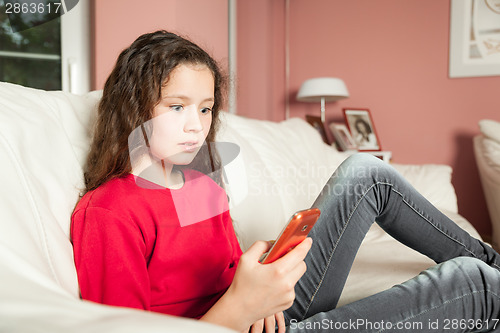 Image of young girl mobile phone