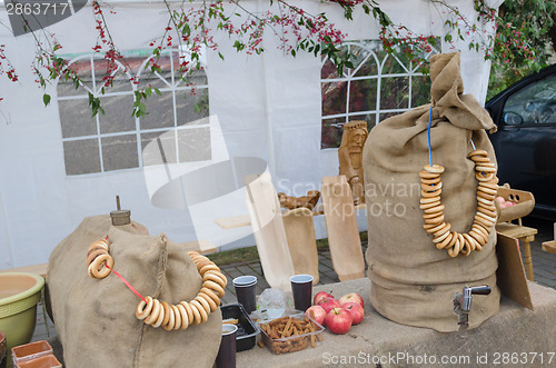 Image of mead barrel under bags decorated crispy string  