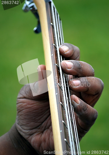 Image of Electric bass guitar.