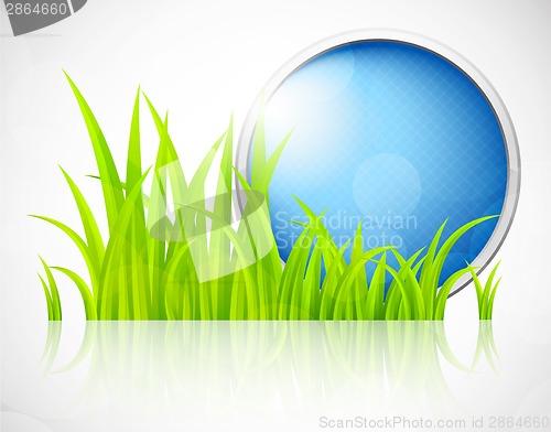 Image of Round blue frame in grass