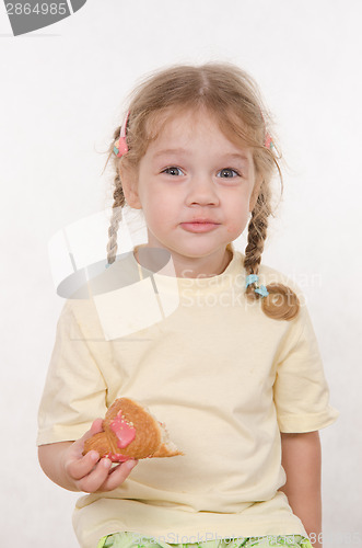 Image of Portrait of girl with a bun