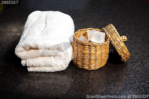 Image of Soap in a basket and towel