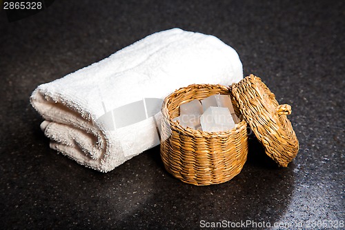 Image of Soap in a basket and towel