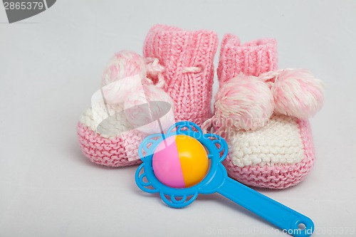 Image of pink baby's bootees