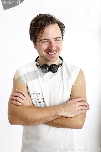 Image of Attractive smiling man with headphones 