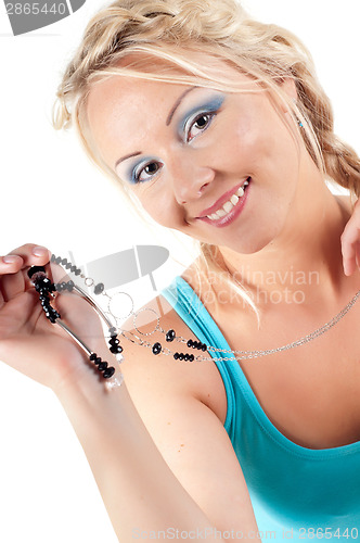 Image of Beauty shoot of happy woman in blue