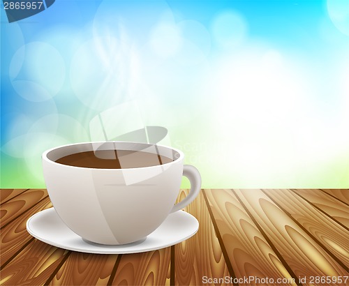 Image of Coffee cup on wooden table
