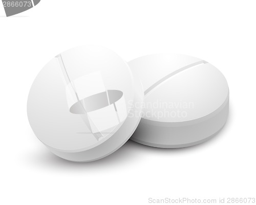 Image of Two pills isolated on white