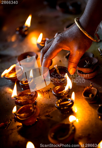 Image of Burning candles in the Indian temple.