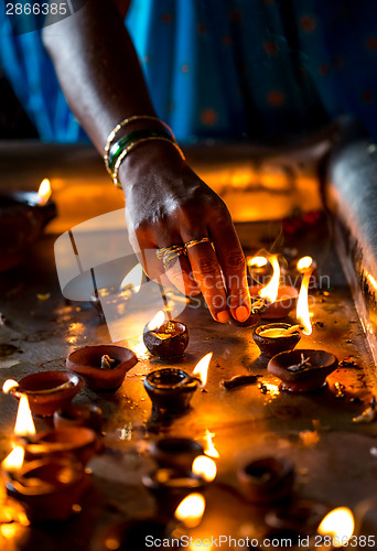 Image of Burning candles in the Indian temple.