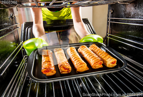 Image of Cooking in the oven at home.