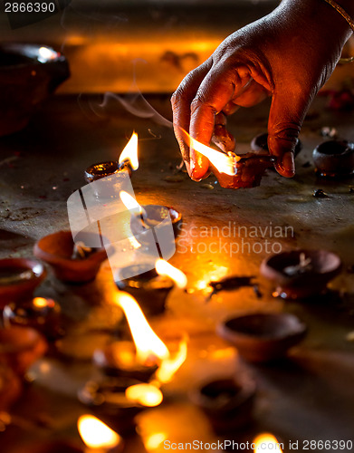 Image of Burning candles in the Indian temple.