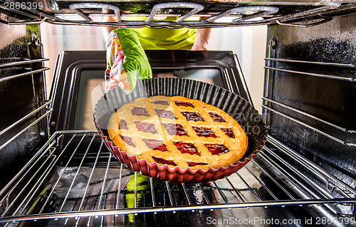 Image of Cooking in the oven at home.