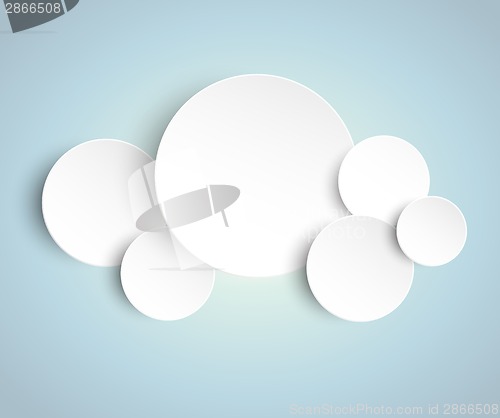 Image of Paper circles on blue background
