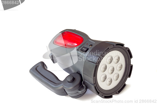 Image of Electric rechargeable led flashlight on a white background.