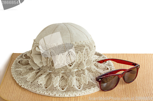 Image of Female summer hat for protection against the sun on a white back